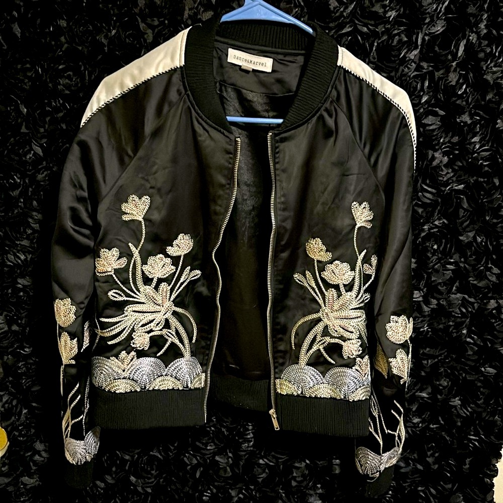 Dance and marvel bomber jacket with knitted flower embellishments